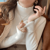 Blusa Peluciada e Canelada com Gola Alta